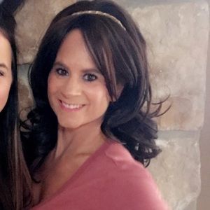 Extra long brown wig. Perfect condition w bag.